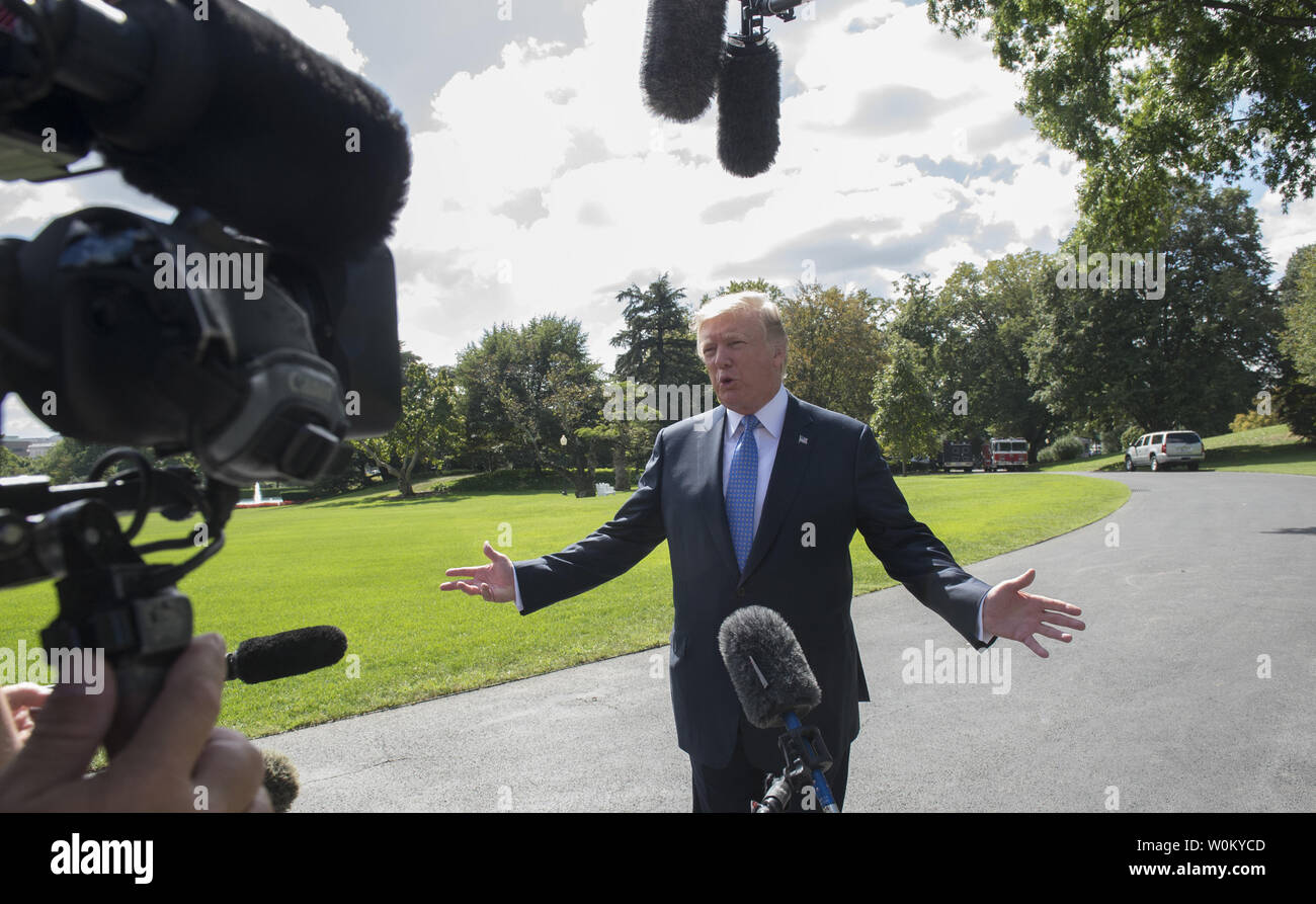 U.S. President Donald Trump holds an impromptu press conference on the ...
