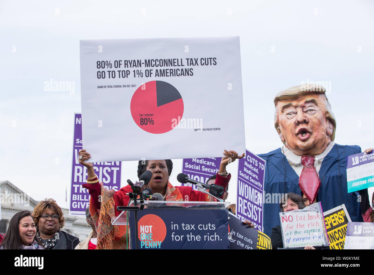 Rep. Sheila Jackson Lee (D-TX) holds up a sign that states '80% of Ryan-McConnell tax cuts go to the top 1% of americans' while speaking at a rally against the Trump tax plan organized by The Patriotic Millionaires on Capitol Hill in Washington, DC on November 1, 2017.     Photo by Erin Schaff/UPI Stock Photo