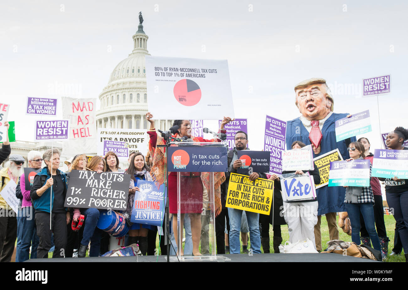 Rep. Sheila Jackson Lee (D-TX) holds up a sign that states '80% of Ryan-McConnell tax cuts go to the top 1% of americans' while speaking at a rally against the Trump tax plan organized by The Patriotic Millionaires on Capitol Hill in Washington, DC on November 1, 2017.     Photo by Erin Schaff/UPI Stock Photo