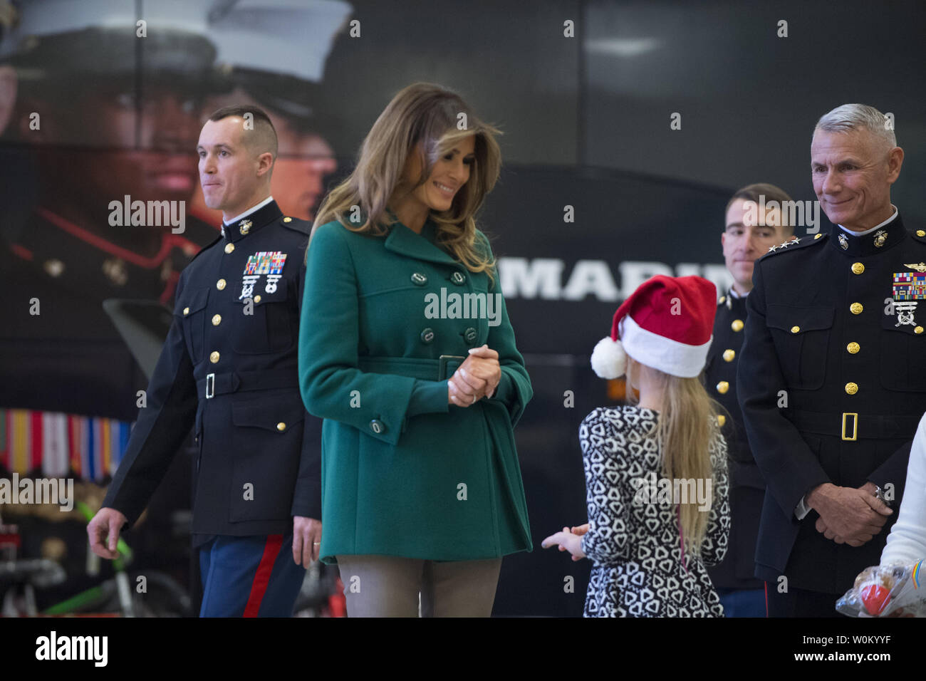 First Lady Melania Trump talks with a 
