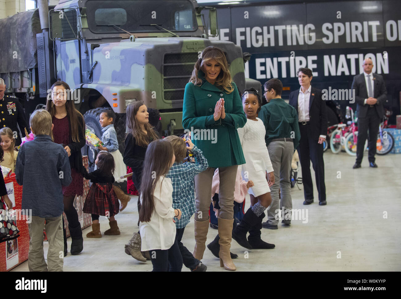 First Lady Melania Trump helps children as they participate in the Marine Corps Reserve Toys for Tots Campaign at Joint Base Anacostia-Bolling in Washington, DC on December 13, 2017.  The first lady helped write holiday cards, sort and box toys at the base with military children to help other children in the DC area.   Photo by Pat Benic/UPI Stock Photo