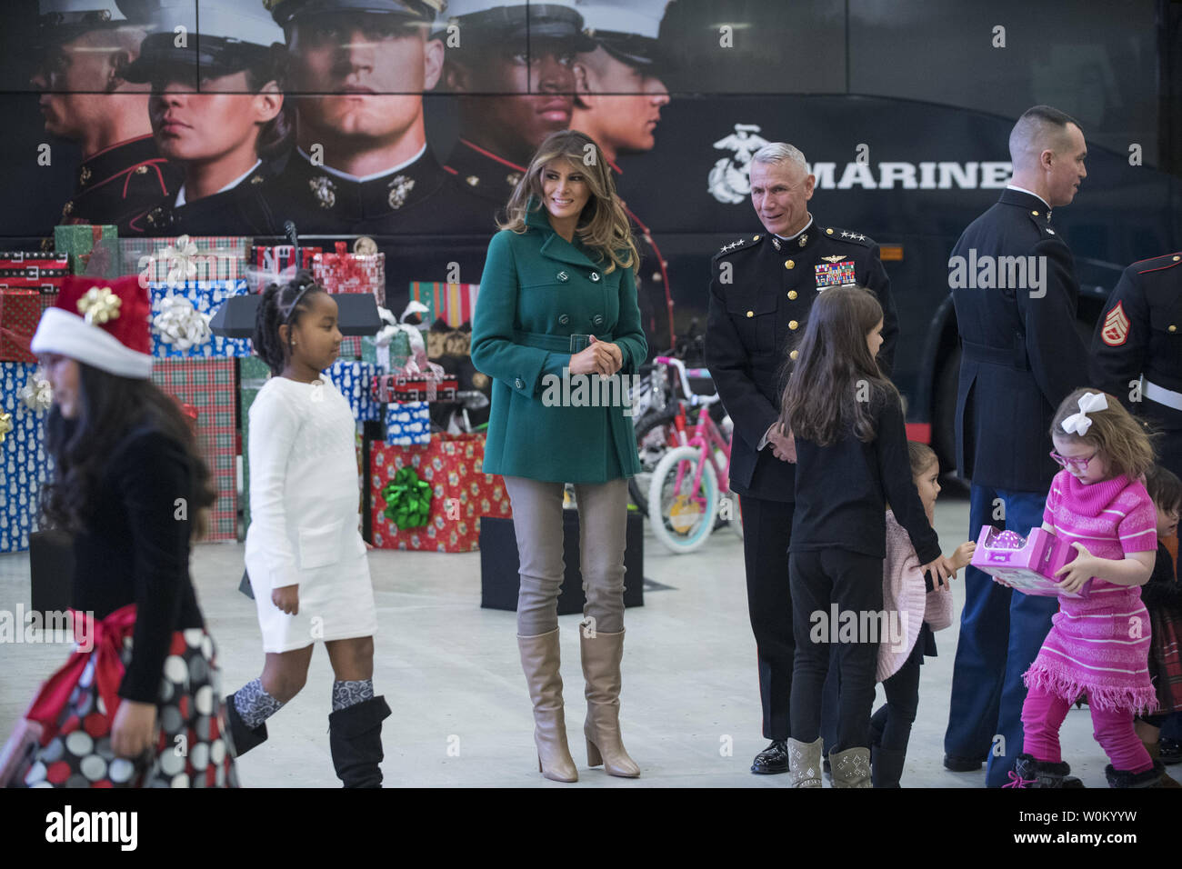 First Lady Melania Trump helps children as they participate in the Marine Corps Reserve Toys for Tots Campaign at Joint Base Anacostia-Bolling in Washington, DC on December 13, 2017.  The first lady helped write holiday cards, sort and box toys at the base with military children to help other children in the DC area.   Photo by Pat Benic/UPI Stock Photo