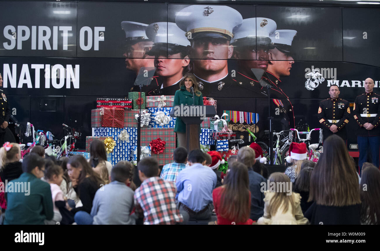 First Lady Melania Trump makes remarks as she participates in the Marine Corps Reserve Toys for Tots Campaign at Joint Base Anacostia-Bolling in Washington, DC on December 13, 2017.  The first lady helped write holiday cards, sort and box toys at the base with military children to help other children in the DC area.   Photo by Pat Benic/UPI Stock Photo