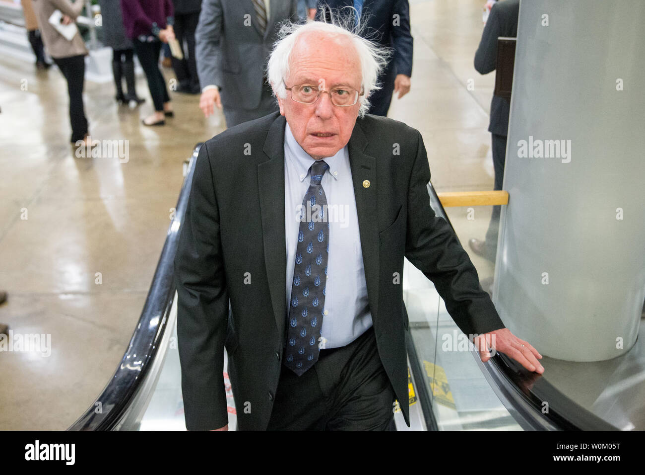 Sen. Bernie Sanders (I-VT) walks to the weekly Democratic caucus lunch on Capitol Hill in Washington, DC on December 19, 2017. The Senate is planning to vote on the tax bill this evening.     Photo by Erin Schaff/UPI. Stock Photo