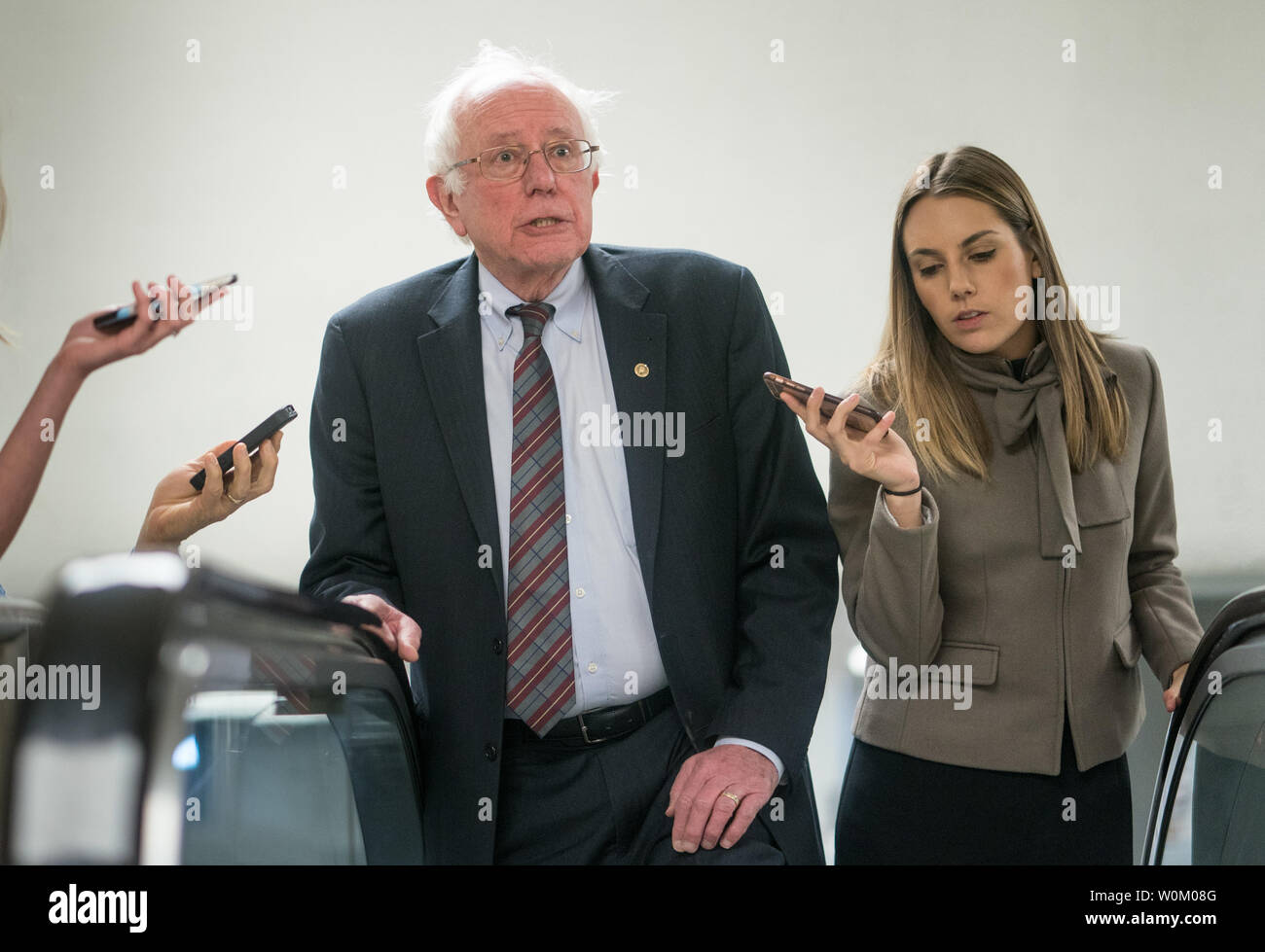 Sen. Bernie Sanders (I-VT) takes an escalator on his way to a vote on a Continuing Resolution to re-open the government on the third day of a government shutdown in Washington, DC on January 22, 2018. The vote to re-open the government passed the Senate 81-18. Photo by Erin Schaff/UPI Stock Photo