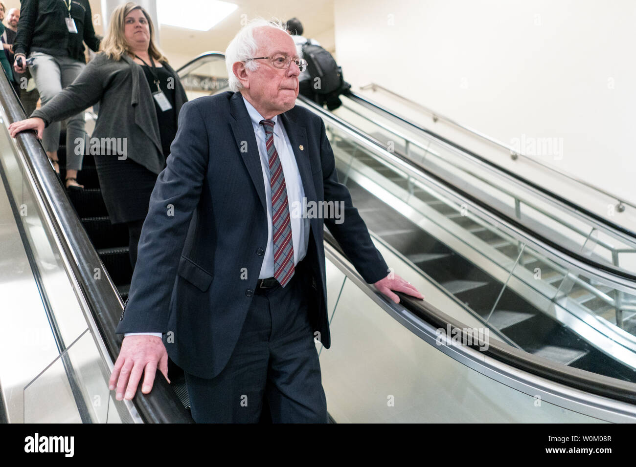 Sen. Bernie Sanders (I-VT) takes an escalator after voting on a Continuing Resolution to re-open the government on the third day of a government shutdown in Washington, DC on January 22, 2018. The vote to re-open the government passed the Senate 81-18. Photo by Erin Schaff/UPI Stock Photo