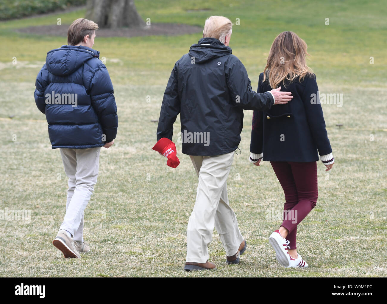 President Donald Trump, first lady Melania Trump and son Barron depart via Marine One on the South Lawn of the White House in Washington, DC on March 8, 2019.   The president will stop in Alabama on his way to Mar-a-Lago, Florida for the weekend.     Photo by Pat Benic/UPI Stock Photo