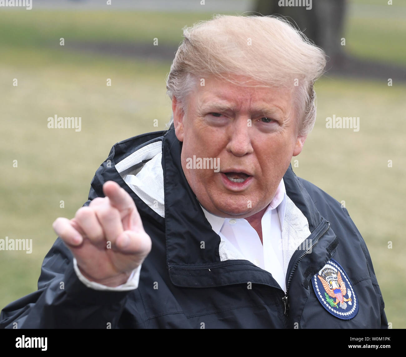 President Donald Trump reacts to a reporter's question during a brief press conference prior to departing via Marine One on the South Lawn of the White House in Washington, DC on March 8, 2019.   The president will stop in Alabama on his way to Mar-a-Lago, Florida for the weekend.     Photo by Pat Benic/UPI Stock Photo