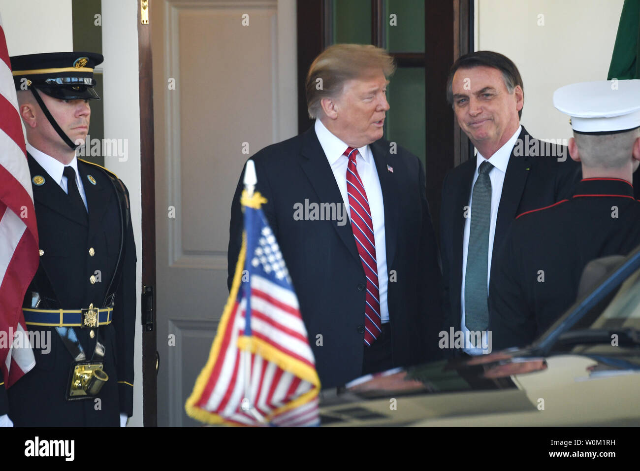 President Donald Trump greets Brazilian President Jair Bolsonaro at the West Wing of the White House prior to meetings in Washington, DC on March 19, 2019.     Photo by Pat Benic/UPI Stock Photo
