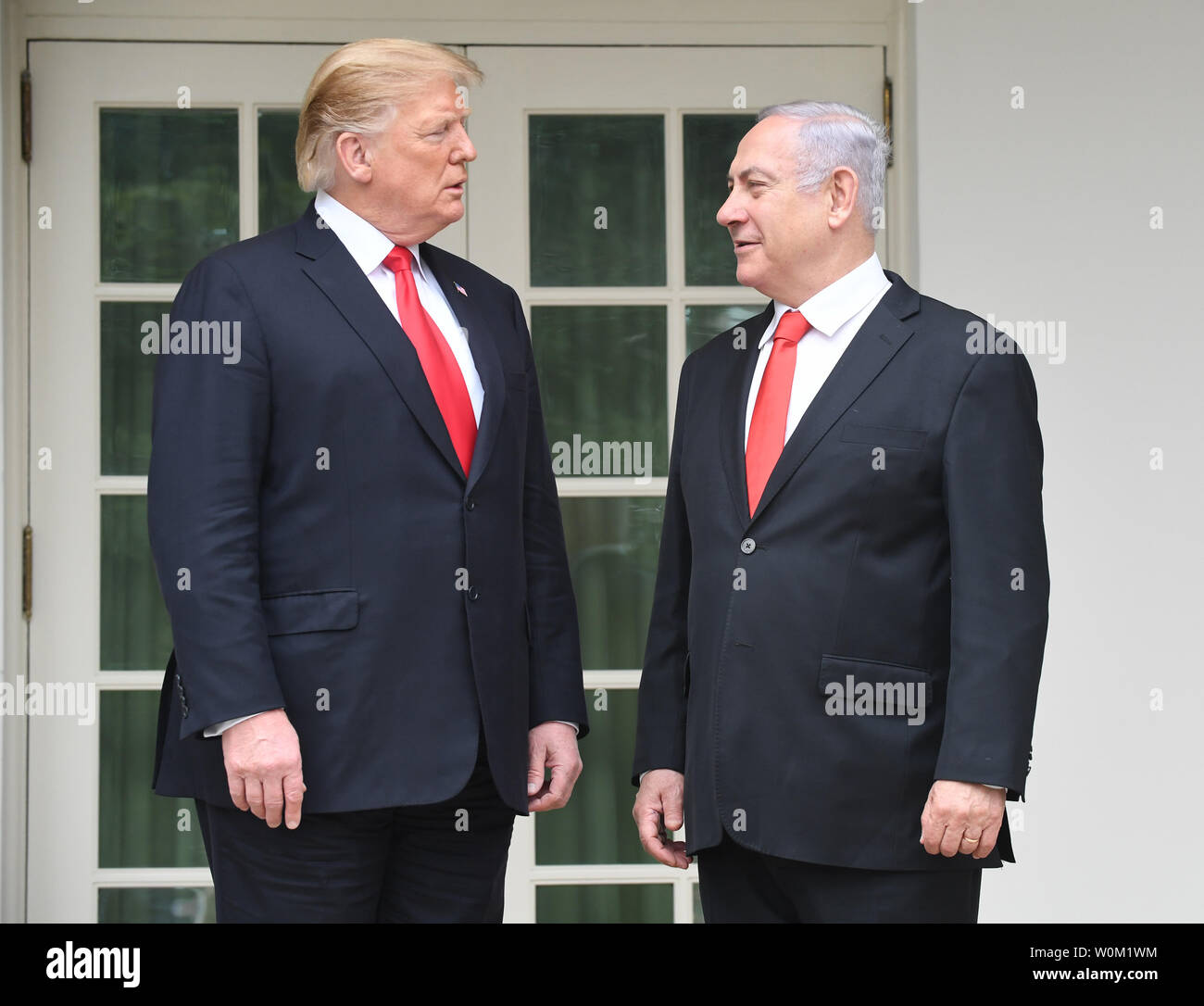 President Donald Trump talks with Israeli Prime Minister Benjamin Netanyahu outside the Oval Office of the White House in Washington, DC on March 25, 2019.  The leaders signed an agreement on the Golan Heights recognizing it as Israeli Territory during a one-day visit.    Photo by Pat Benic/UPI Stock Photo
