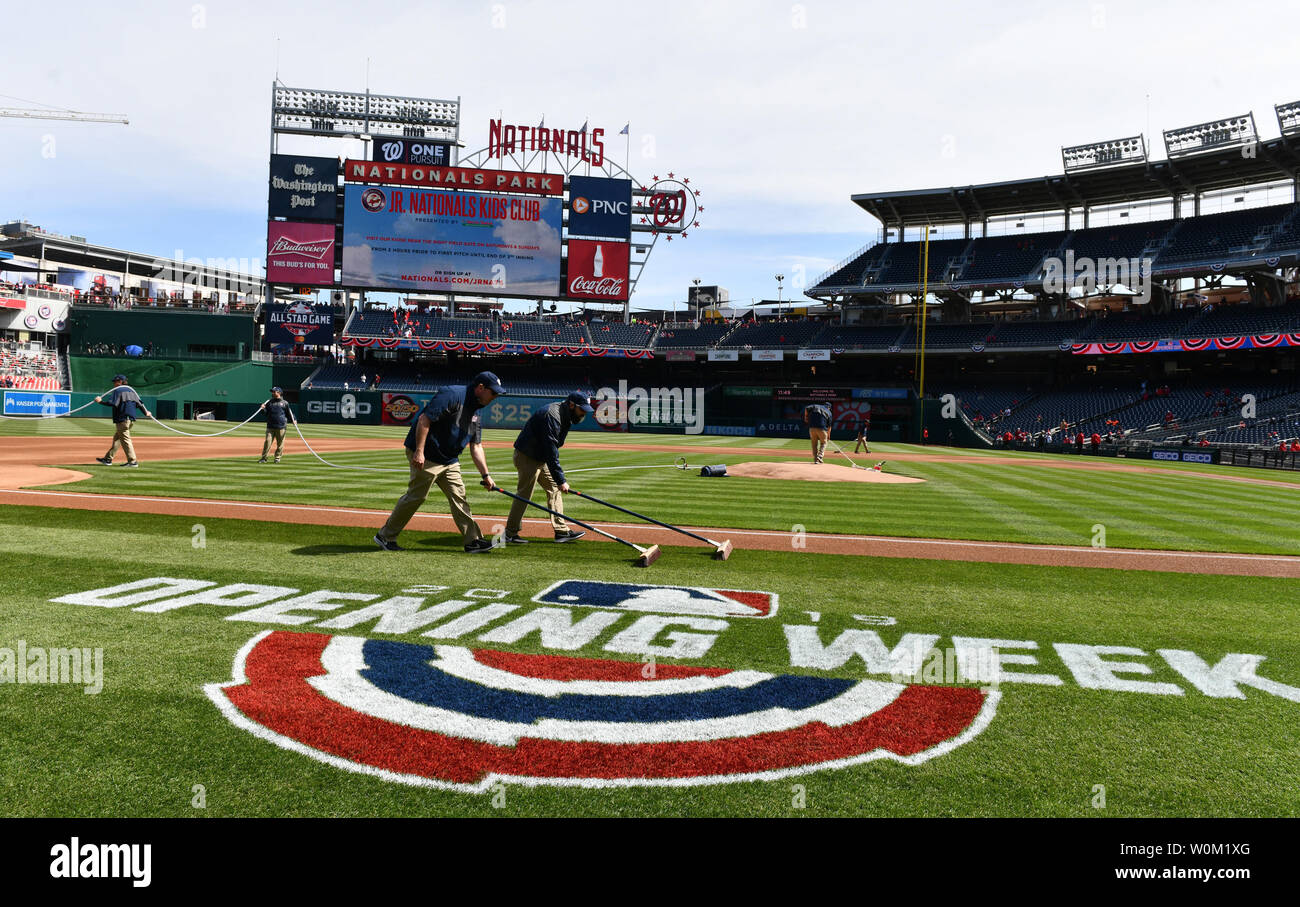 The ground crew gets the field ready prior to the first pitch of Opening Day of the New York Mets at the Washington Nationals at Nationals Park in Washington, DC on March 28, 2019.  Photo by Pat Benic/UPI Stock Photo