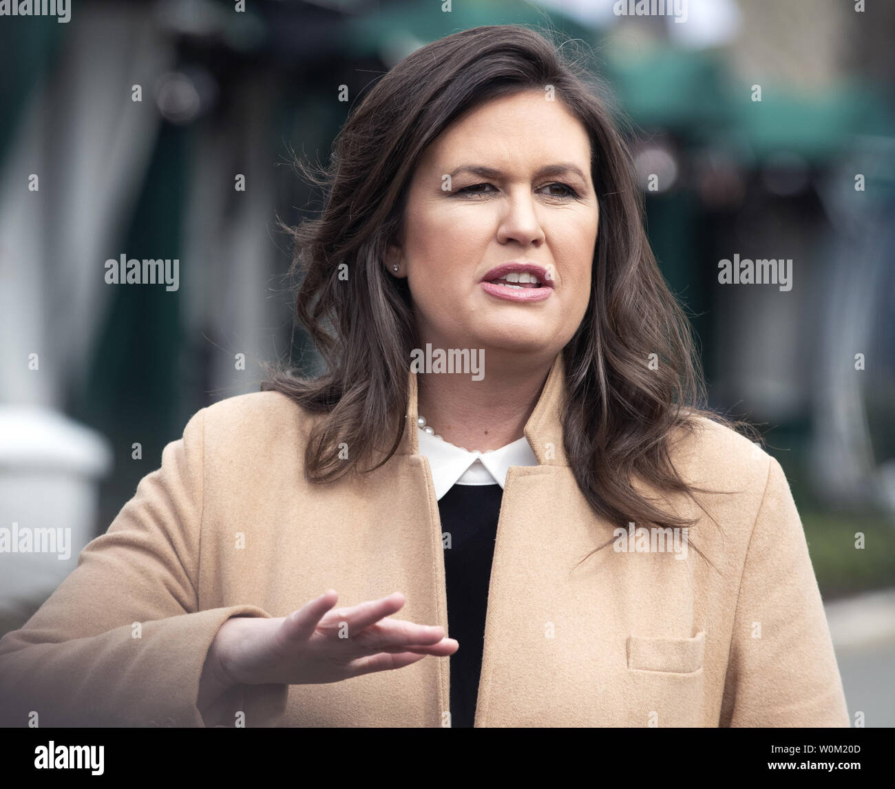 Press Secretary Sarah Sanders makes comments as she answers questions from reporters at an impromptu briefing on the driveway of the west wing of the White House in Washington, DC on April 2, 2019.   Sanders commented on health care and the southern border.    Photo by Pat Benic/UPI Stock Photo