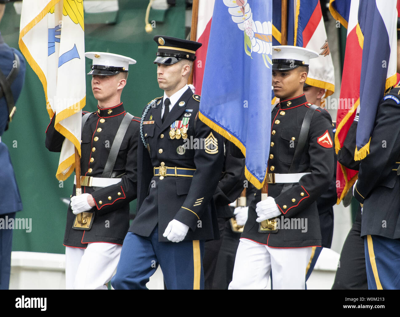 Honor Guard march in formation as the await the arrival of Egyptian President Abdel Fattah el-Sisi at the the West Wing of the White House in Washington, DC on April 9, 2019.  El-Sisi is visiting the White House for talks with President Donald Trump.     Photo by Pat Benic/UPI Stock Photo