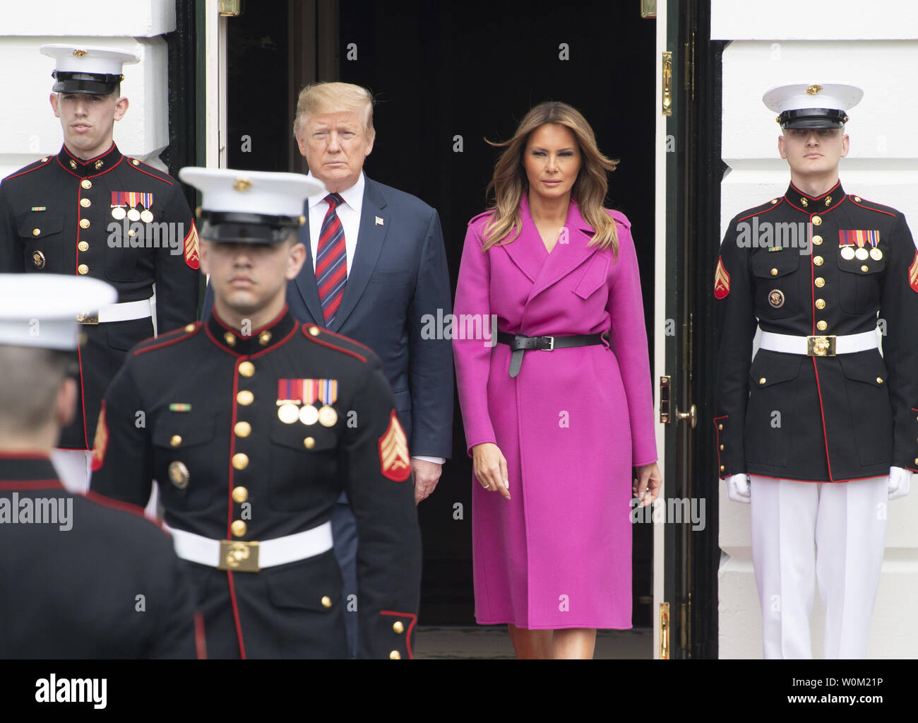 President Donald Trump and first lady Melania Trump walk out to greet South Korean President Moon Jae-in and his wife Kim Jung-sook on the South Lawn of the White House in Washington, DC on April 11, 2019.   President Moon and Trump met in the Oval Office for meetings.    Photo by Pat Benic/UPI Stock Photo