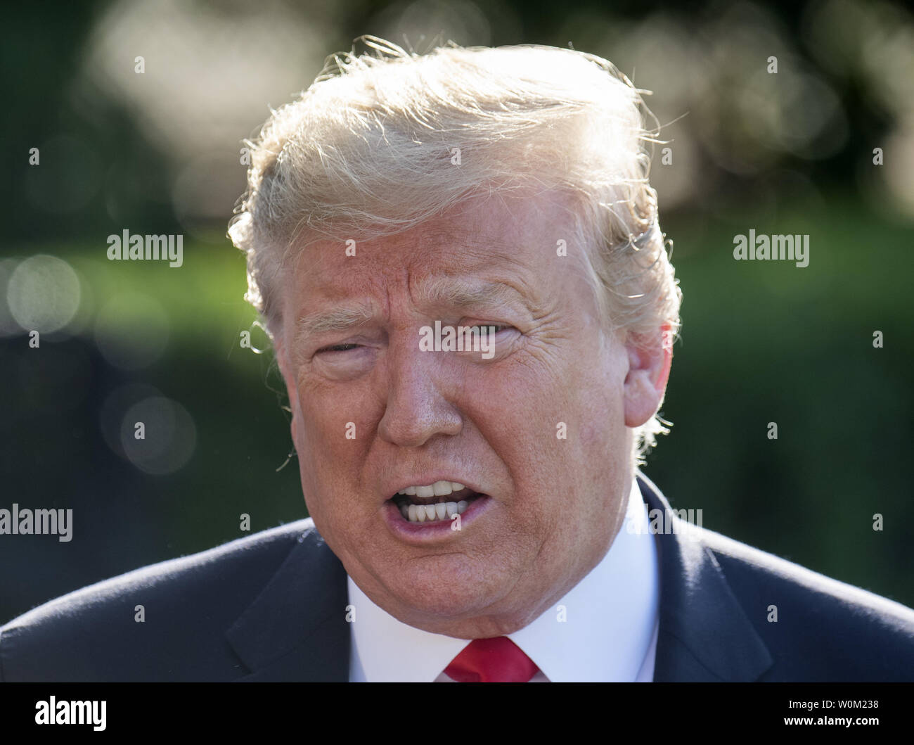 President Donald Trump reacts to a reporter's question during a press conference prior to departing via Marine One on the South Lawn of the White House in Washington, DC on May 30, 2019.   The president gave his interpretations the remarks by Robert Mueller on the probe into Russian interference in the 2016 election.  He will be in Colorado for the day.     Photo by Pat Benic/UPI Stock Photo
