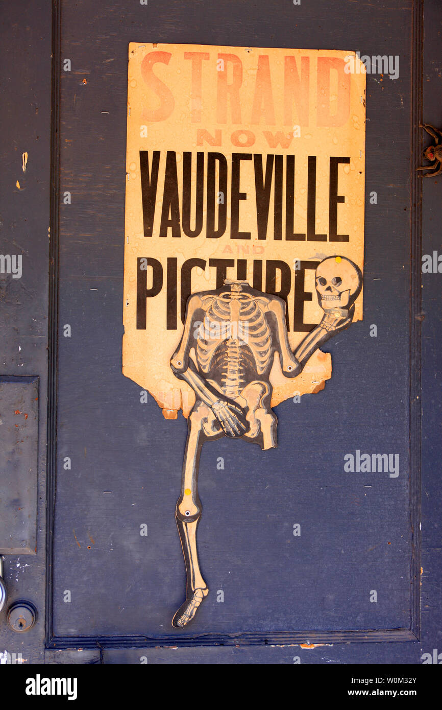 Headless skeleton poster on the door of the Seance Theater on Brewery Ave in Bisbee, AZ Stock Photo