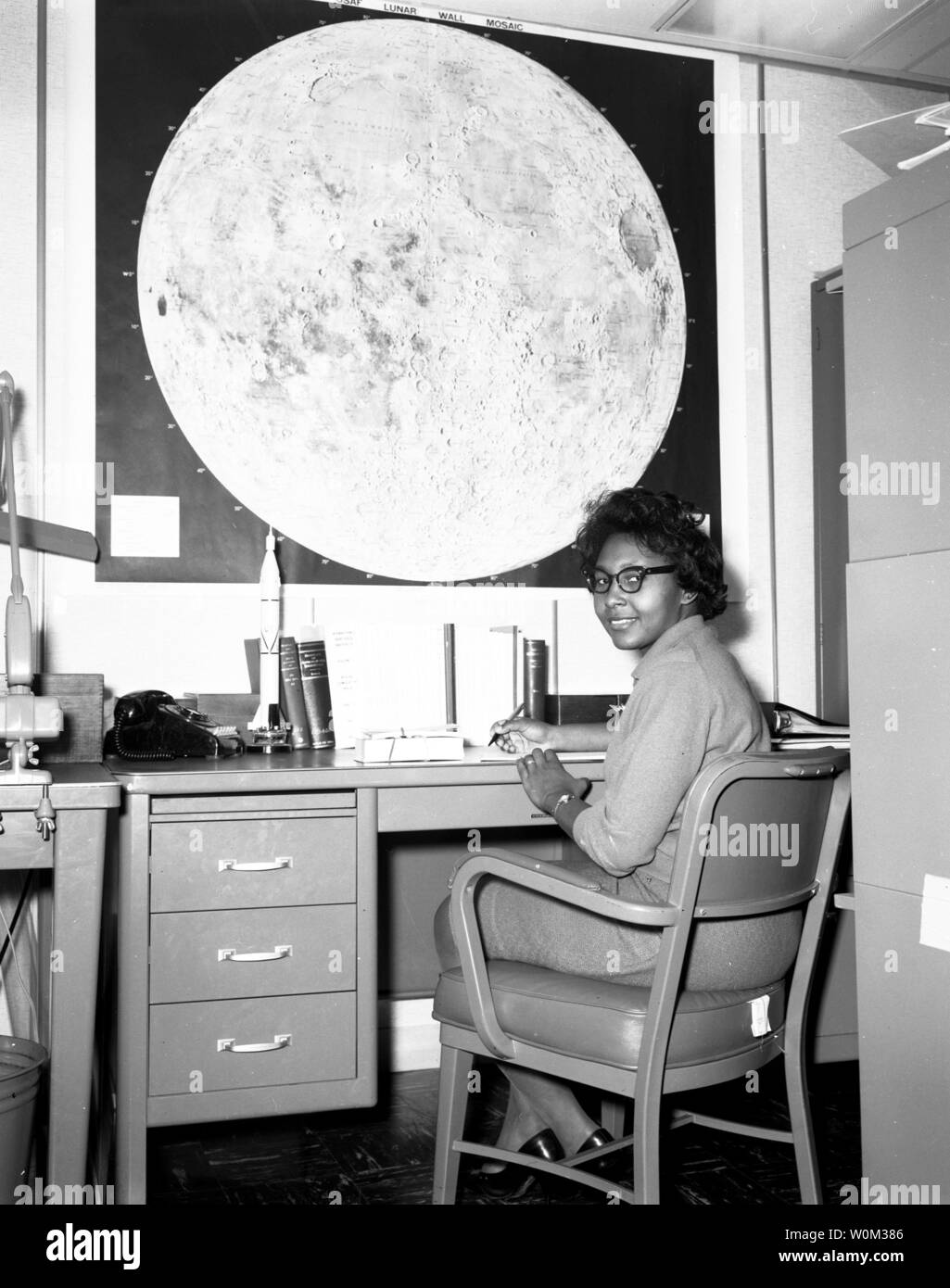 Jeanette Scissum, seen here in this undated photograph, joined NASA's Marshall Space Flight Center in 1964 after earning her bachelor's and master's degrees in mathematics from Alabama A&M University. Scissum published a NASA report in 1967, 'Survey of Solar Cycle Prediction Models,' which put forward techniques for improved forecasting of the sunspot cycle. In 1975, Scissum wrote an article for the National Technical Association, 'Equal Employment Opportunity and the Supervisor - A Counselor's View,' which argued that many discrimination complaints could be avoided 'through adequate and meani Stock Photo