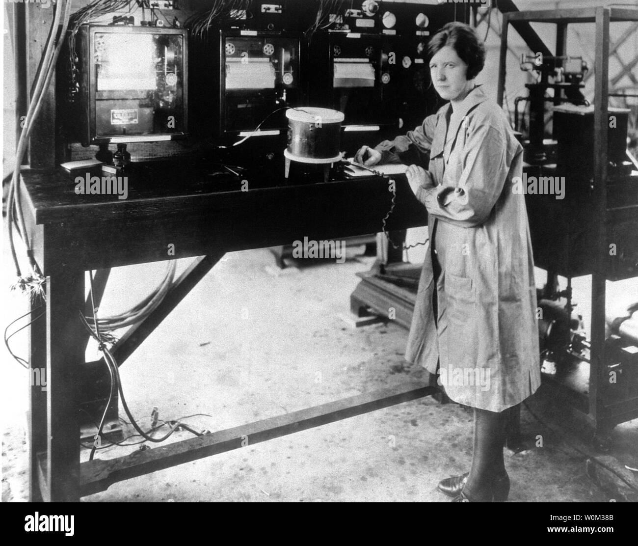In this March 29, 1929, photograph, Pearl I. Young is working in the Langley Memorial Aeronautical Laboratory's Flight Instrumentation Facility (Building 1202). Young was the first woman hired as a technical employee, a physicist at the National Advisory Committee for Aeronautics (NACA) and the second female physicist working for the federal government. Ms. Young graduated in 1919 from the University of North Dakota (UND) as a Phi Beta Kappa with a triple major in physics, mathematics, and chemistry. In 1922, she accepted an appointment at the NACA's Langley Memorial Aeronautical Laboratory (n Stock Photo