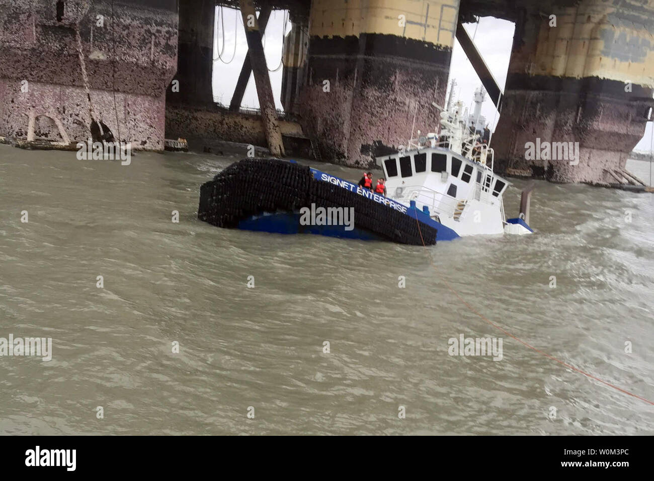 The Coast Guard rescued 15 people in distress near Port Aransas, Texas, in response to Hurricane Harvey, on August 26, 2017. Two Coast Guard Air Station Corpus Christi MH-65 Dolphin helicopter aircrews were launched to assist the people in distress aboard the vessels Sabine Pass, Sandy Point, and Signet Enterprise. Photo by U.S. Coast Guard/UPI Stock Photo