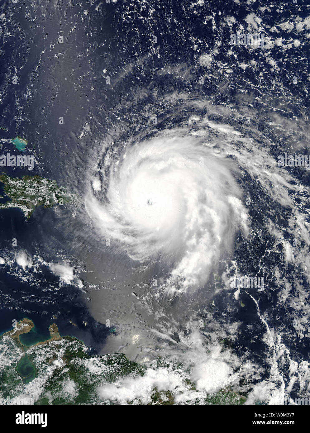 NASA-NOAA's Aqua/MODIS satellite captured this image of Hurricane Irma over the Leeward Islands and Puerto Rico on September 6, 2017, at 12:45 p.m. EDT (1745 UTC). As of 5 p.m. on September 6, Irma was moving away from the Virgin Islands and spreading over portions of Puerto Rico. A state of emergency was declared in the state by Governor Scott on Monday. Hurricane Irma was elevated to a category 5 storm on Tuesday morning. NASA/UPI Stock Photo