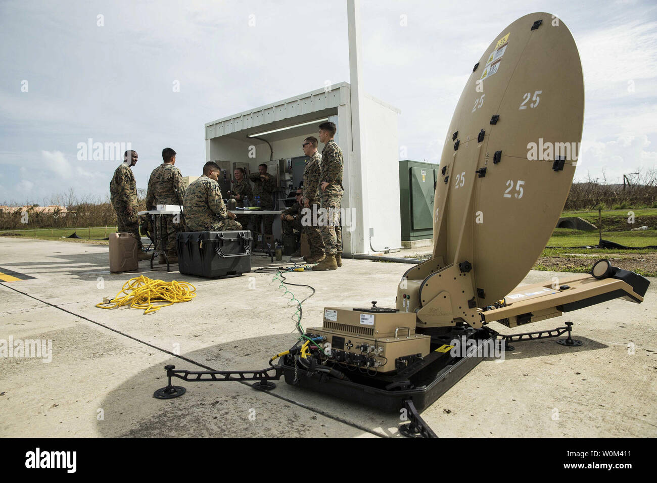 U.S. Marines with Battalion Landing Team 2nd Battalion, 6th Marine Regiment, 26th Marine Expeditionary Unit (MEU), establish communication operations to assist in the relief efforts for victims of Hurricane Maria at Jose Aponte de la Torre Airport, Ceiba, Puerto Rico, on September 23, 2017. The 26th MEU is supporting the Federal Emergency Management Agency, the lead federal agency, and local authorities in Puerto Rico and the U.S. Virgin Islands with the combined goal of protecting the lives and safety of those in affected areas. Photo by Lance Cpl. Tojyea Matally/U.S. Marine Corps/UPI Stock Photo