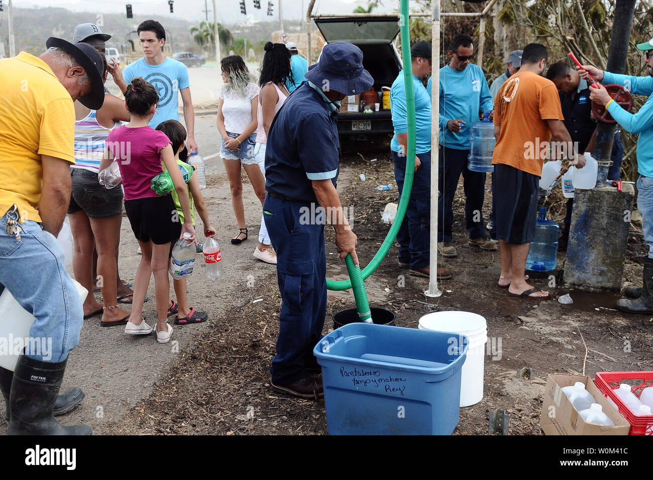 Puerto Rico Support Guardsmen from the Puerto Rico National Guard, along with employees ...