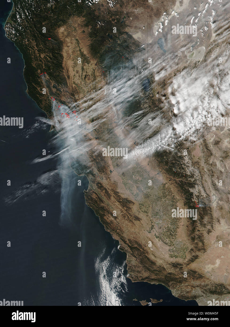 This satellite image was The Suomi NPP satellite's Visible Infrared Imaging Radiometer Suite (VIIRS) instrument captured a look at multiple fires and smoke in California on October 11, 2017. Yesterday the Tubbs fire had destroyed 28,000 acres, and today the acreage has grown to 34,270. The Nuns fire which yesterday had consumed 5,000 acres has grown to 14,698 acres. Atlas was at 26,000 acres and today is at 43,762. The Partrick fire had affected 6,000 acres and today has grown to 10,817, and the Redwood Complex which devastated 29,500 acres has now grown to 32,100 acres. The California fires s Stock Photo