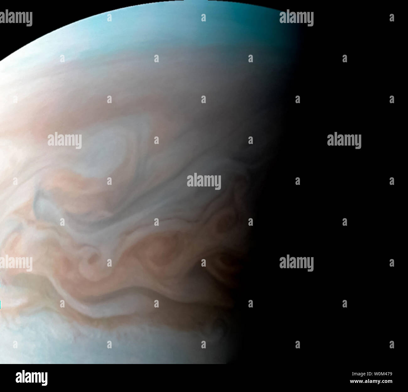This close-up view of Jupiter captures the turbulent region just west of the Great Red Spot in the South Equatorial Belt, with resolution better than any previous pictures from Earth or other spacecraft. NASA's Juno spacecraft captured this image with its JunoCam citizen science instrument when the spacecraft was a mere 5,400 miles (8,700 kilometers) above JupiterÕs cloud tops on December 11, 2016, at 9:14 a.m. PT (12:14 p.m. ET). NASA/UPI Stock Photo