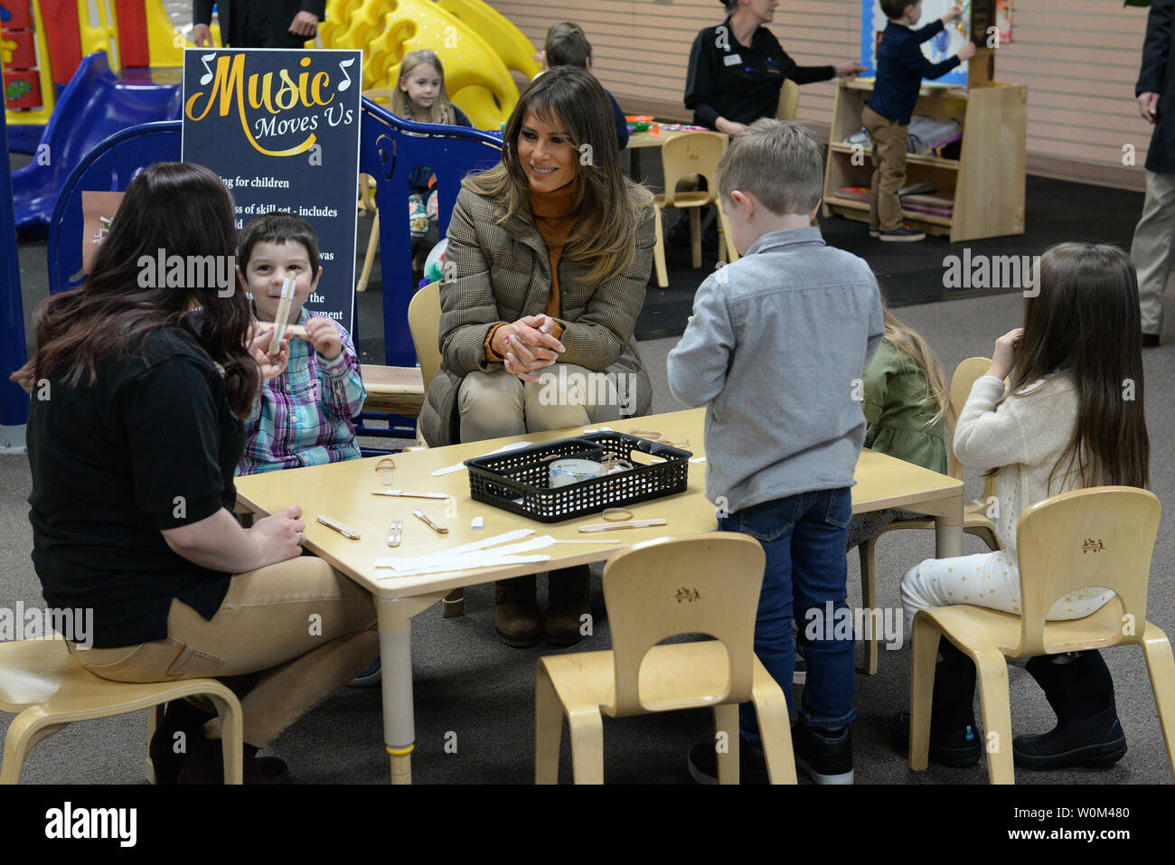 First Lady Melania Trump speaks with children at the Month of the Military Family Celebration event held at the Arctic Oasis on Joint Base Elmendorf-Richardson, Alaska, on November 10, 2017. The First Lady was returning from a Pacific Theater tour she attended with President Donald Trump. Photo by Staff Sgt. Westin Warburton/U.S. Air Force/UPI Stock Photo