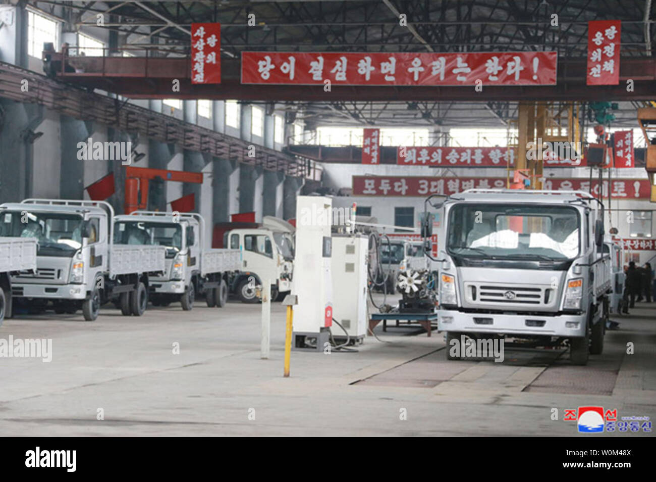 This image released on November 21, 2017, by the North Korean Official News Service (KCNA), shows North Korean leader Kim Jong Un visited the Sungri Motor Complex in Pyongyang. During his tour of the facilities, Kim took the wheel of a newly manufactured truck to experience its performance and technical capabilities. Accompanying him were O Su Yong and Pak Thae Song, vice-chairmen of the C.C., Workers' Party of Korea (WPK), and Jo Yong Won, vice department director of the C.C., WPK. Photo by KCNA/UPI Stock Photo