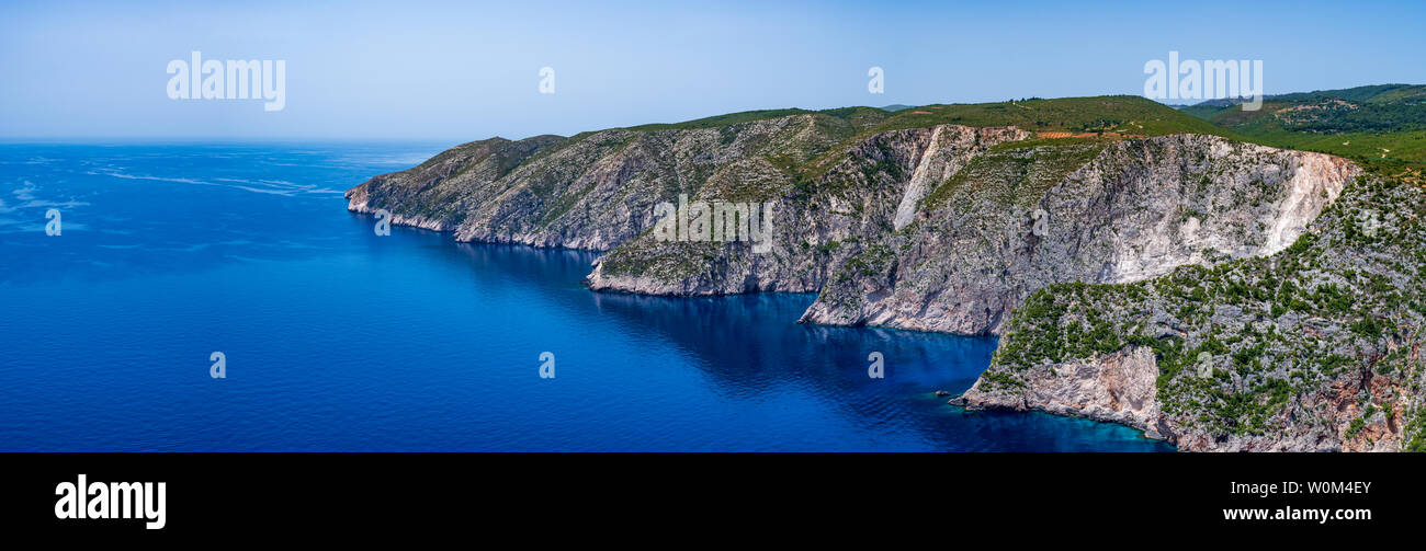 Panoramic view over the cliffs and the deep blue Mediterranean sea at Kambi, Zakynthos, Greece Stock Photo