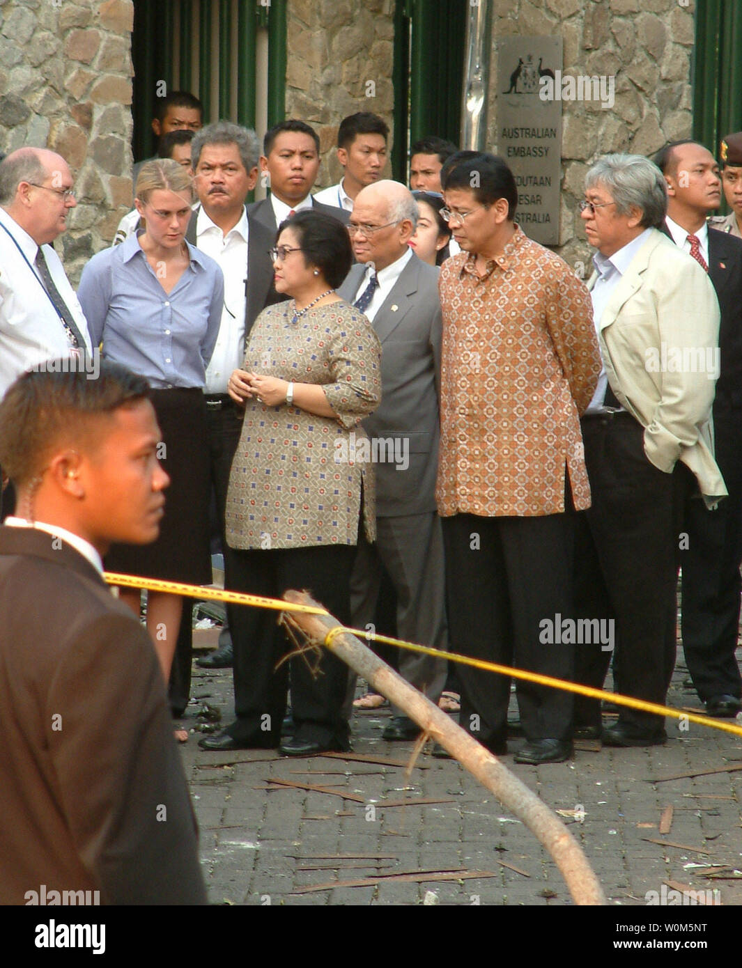 Indonesian President Megawati Soekarnoputri talks to unidentified Australian Embassy staff in front of the Australian Embassy following a bomb blast that killed  at least nine, in Jakarta, Indonesia on September 9, 2004.  (UPI Photo/Saprizal) Stock Photo
