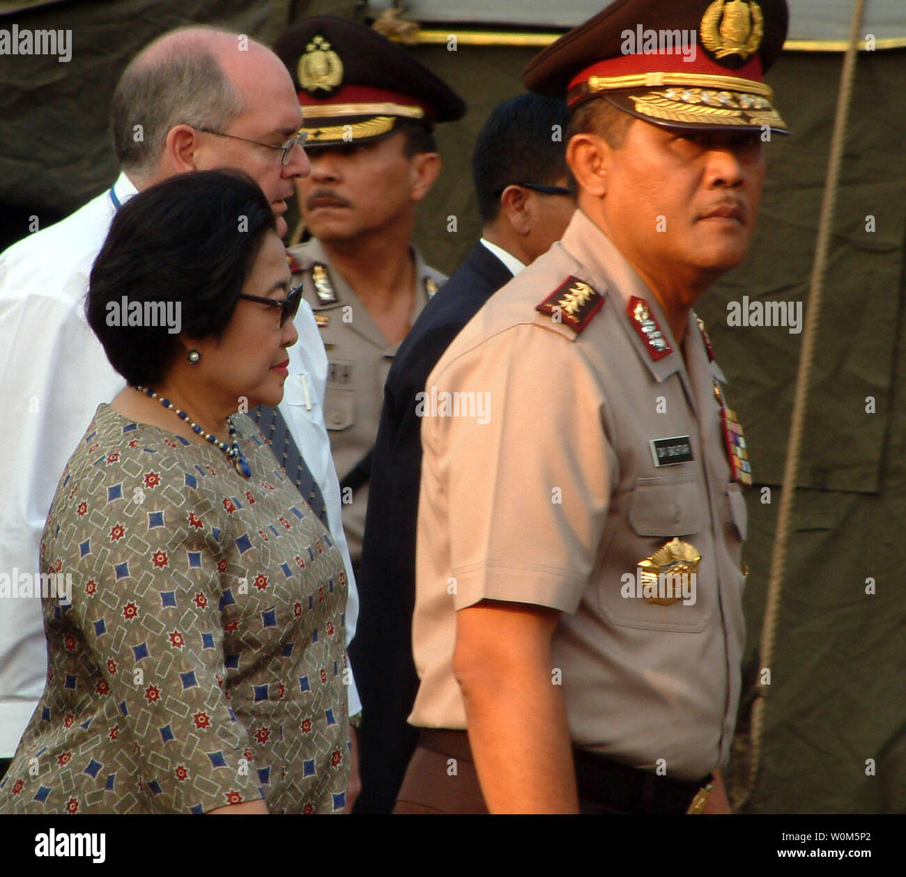 Indonesian President Megawati Soekarnoputri and Chief Police General Da'i Bachtiar visit the Australian Embassy following a bomb blast that killed at least nine people  in Jakarta on September 9, 2004.    (UPI Photo/ Saprizal) Stock Photo