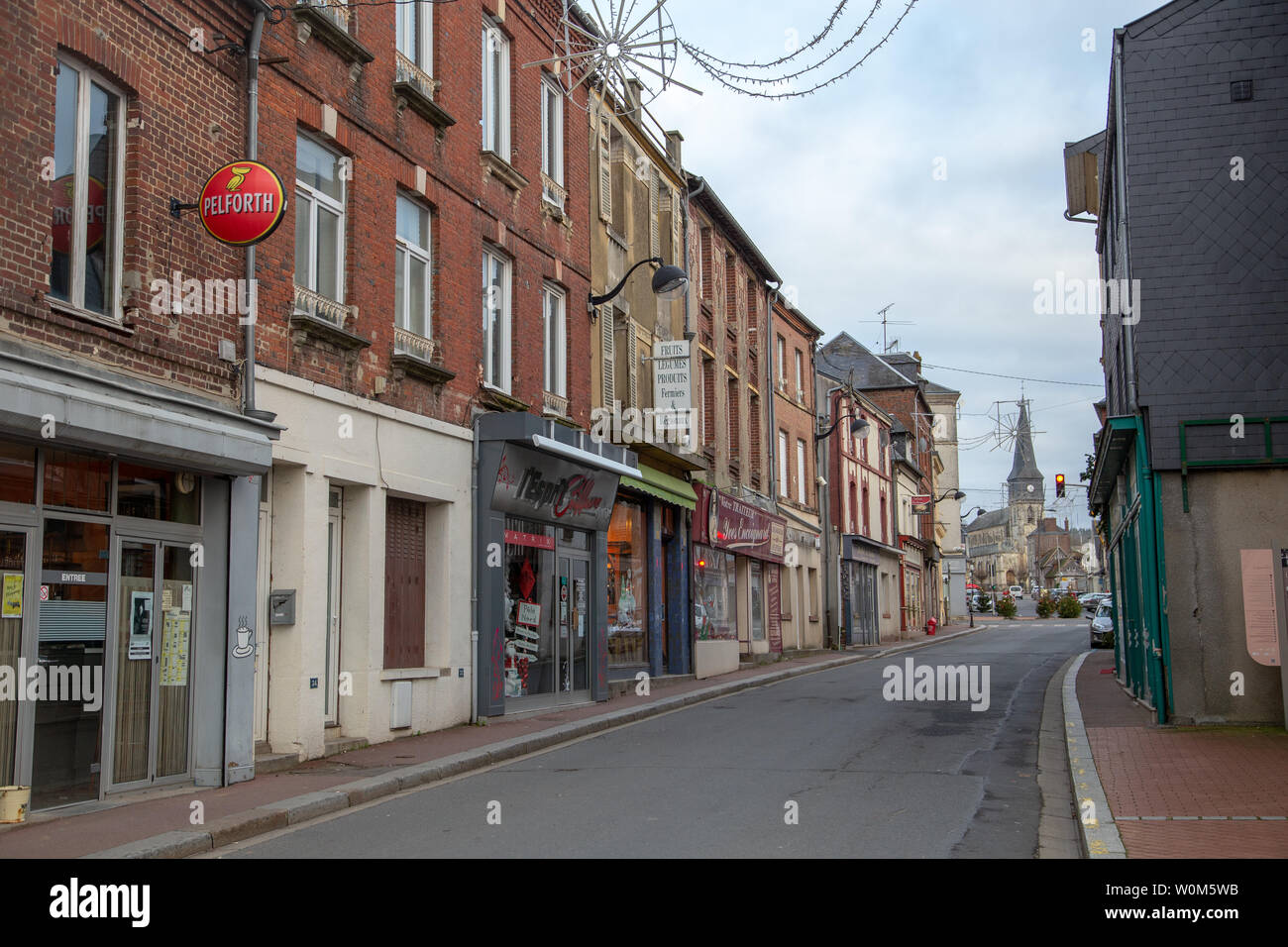 Livarot, France - January 2, 2019: typical buildings and streets of Livarot with no people. Its known for the production of the Livarot cheese. Stock Photo