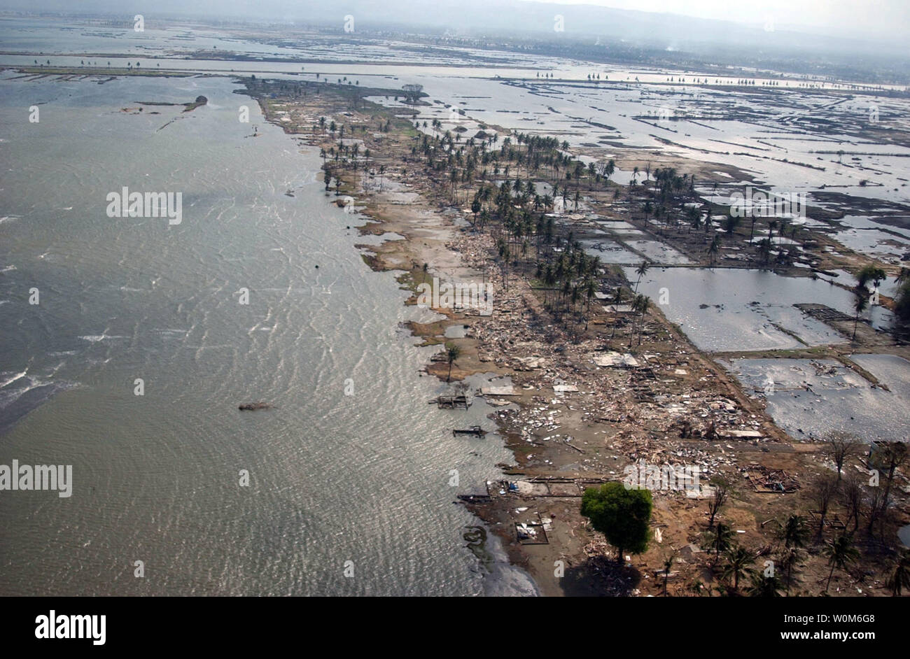 Six weeks after the tsunami hit Banda Aceh on the island of Sumatra, Indonesia, an ariel photograph taken February 12, 2005 shows it is still difficult to tell where the sea stops and land begins. (UPI Photo/ Jon Gesch/Navy) Stock Photo