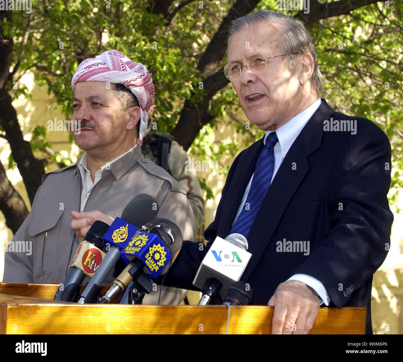 Secretary of Defense Donald H. Rumsfeld and Massoud Barzani conduct a press conference in Sala Huddin, Iraq, on April 12, 2005.  Rumsfeld earlier met with Barzani and other leaders of the Kurdish Democratic Party to discuss points of mutual interest. Rumsfeld is in Iraq to visit with U.S. and coalition forces and to meet with the newly elected members of the Iraqi government.  (UPI Photo/ Cherie A. Thurlby/Air Force) Stock Photo