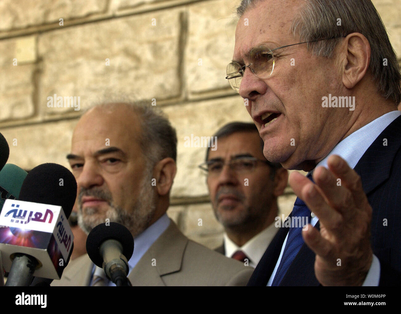 Secretary of Defense Donald H. Rumsfeld (right) and Iraqi Prime Minister Ibrahim Jafari (left) take questions from the press after their meeting at Jafari's residence in Baghdad, Iraq, on April 12, 2005.  Rumsfeld is in Iraq to visit with U.S. and coalition forces and to meet with the newly elected members of the Iraqi government.   (UPI Photo/ Cherie A. Thurlby/Air Force) Stock Photo