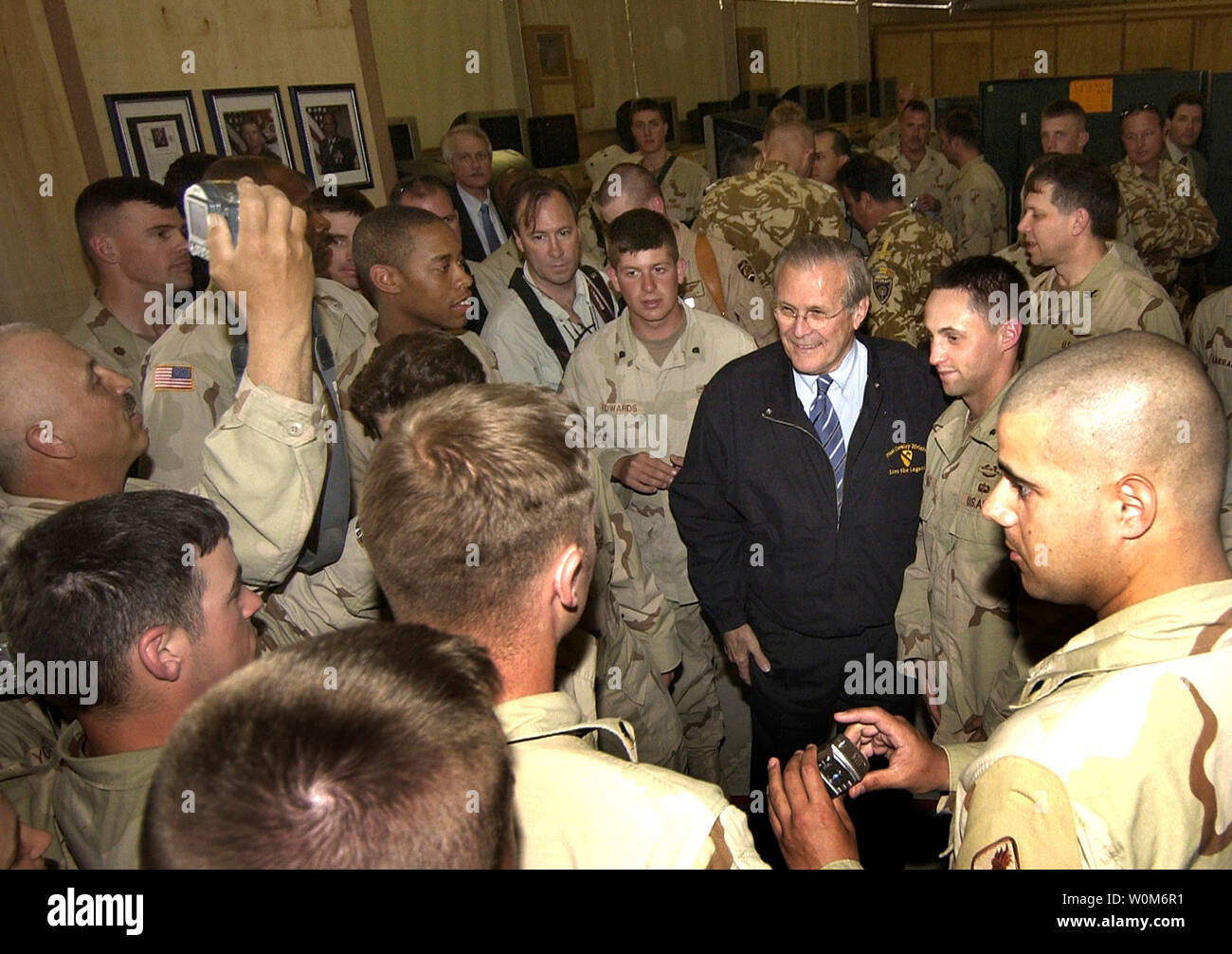 Defense Secretary Donald H. Rumsfeld visits with U. S. troops in Kandahar, Afghanistan, April 13, 2005.  (UPI Photo/ Cherie A. Thurlby/Air Force) Stock Photo