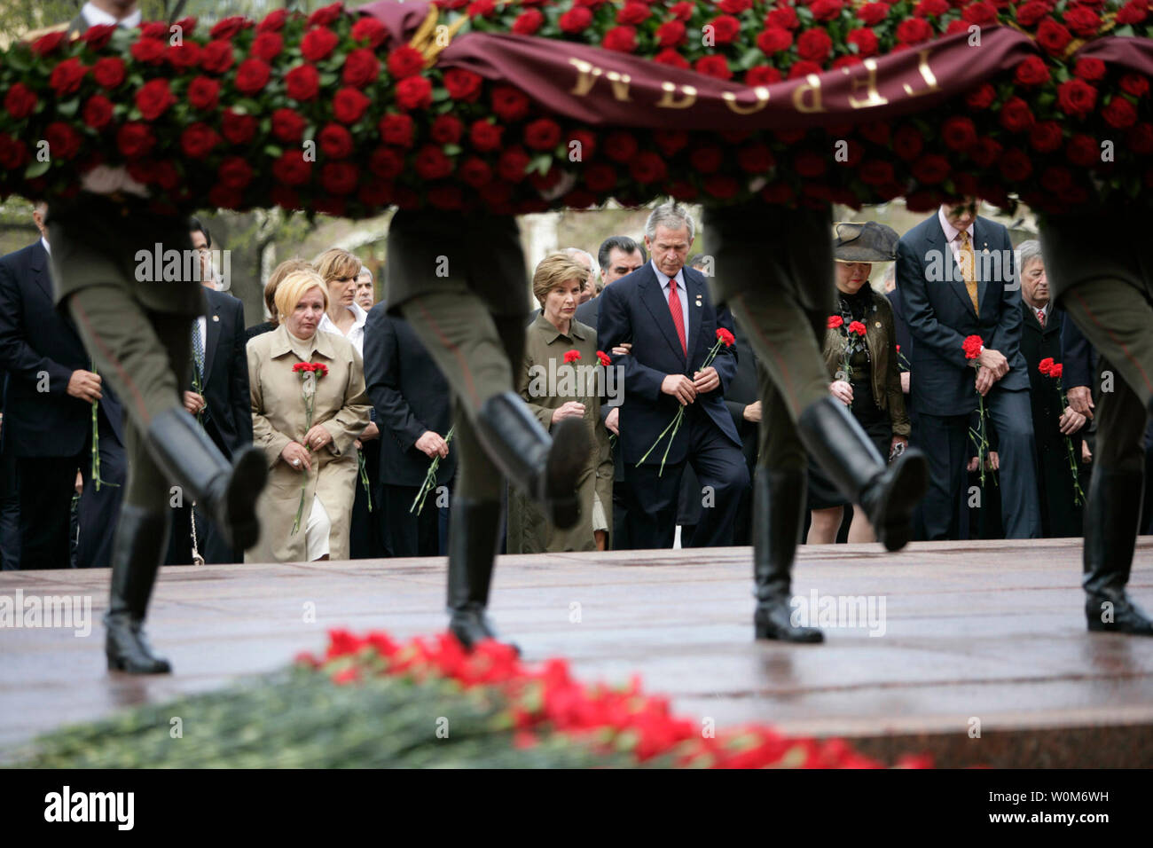 Commemorating the 60th Anniversary of the end of World War II, President George W. Bush and Laura Bush join world leaders in a wreath laying ceremony at the Tomb of the Unknown Soldier at the Kremlin wall Monday, May 9, 2005. (UPI Photo/Eric Draper/White House) Stock Photo