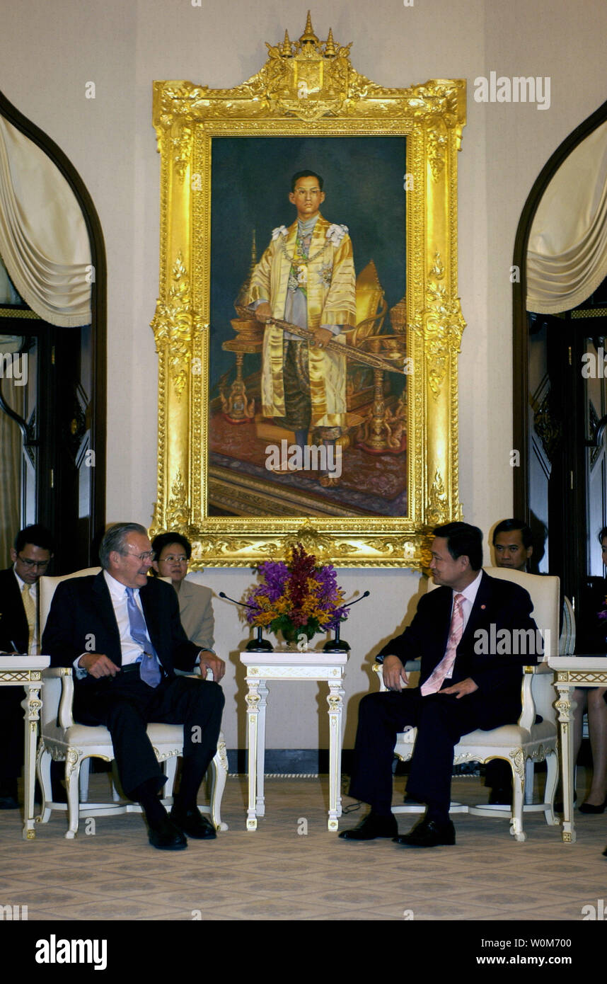 Secretary of Defense Donald H. Rumsfeld (left) meets with Thailand's Prime Minister Thaksin Chinnawat in Bangkok, Thailand, on June 6, 2005.  Rumsfeld is in Thailand to strengthen U.S.-Thai relationships following a three-day International Institute for Strategic Studies Asia Security Conference in Singapore. (UPI Photo/Cherie A. Thurlby/.Air Force) Stock Photo