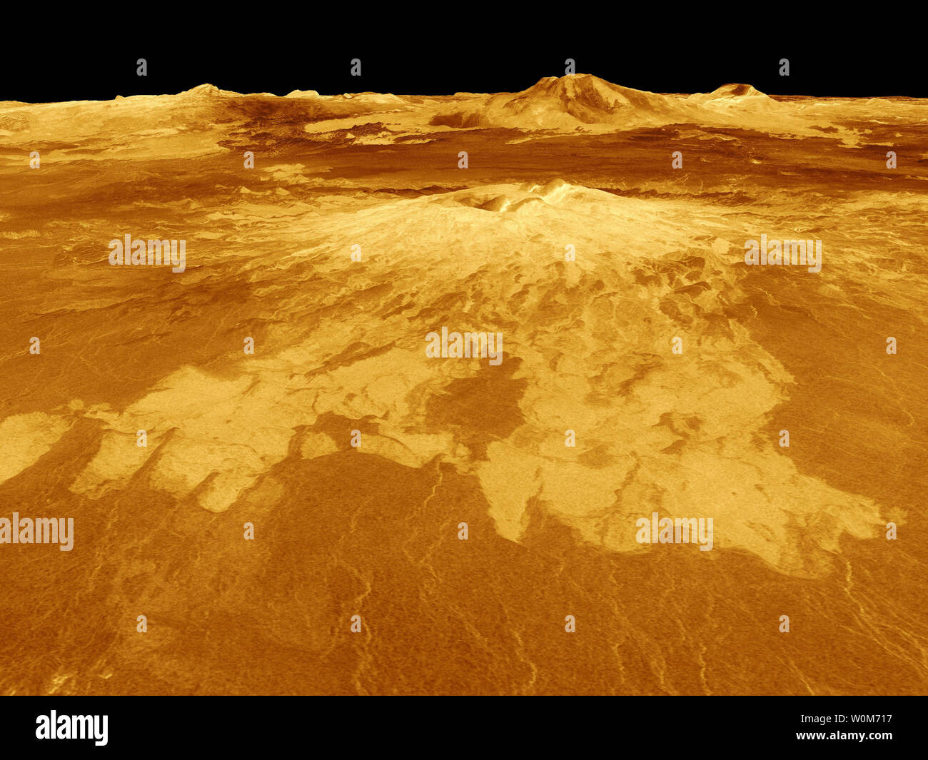 A volcano named Sapas Mons dominates this computer-generated view of the surface of Venus in image released June 30, 2005. Lava flows extend for hundreds of kilometers across the fractured plains shown in the foreground to the base of the mountain, which measures 248 miles across 0.9 mile high. The simulated hues are based on color images recorded by the Soviet Venera 13 and 14 spacecraft. The image was produced by the Solar System Visualization project and the Magellan Science team at the JPL Multimission Image Processing Laboratory.  (UPI Photo/NASA/JPL) Stock Photo