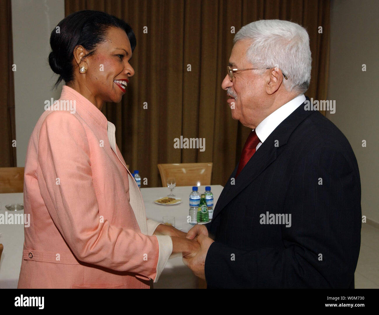 United States Secretary of State Condeleezza Rice (L) shakes hands with ...
