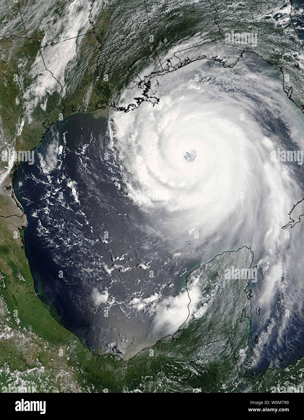 Hurricane Katrina is shown bearing down on New Orleans and the coast lines of Louisiana, Mississippi and Alabama in this NASA satellite image on Aug. 28, 2005. Katrina made landfall early on Aug. 29, and with sustained winds at 150mph and gusts of 184mph, this massive category 5 storm has already caused flooding and severe damage.   (UPI Photo/NASA ho) Stock Photo