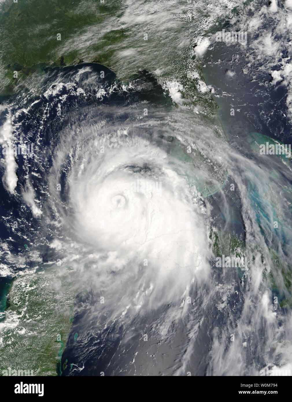 Hurricane Katrina is shown bearing down on New Orleans and the coast lines of Louisiana, Mississippi and Alabama in this NASA satellite image on Aug. 27, 2005. Katrina made landfall early on Aug. 29, and with sustained winds at 150mph and gusts of 184mph, this massive category 5 storm has already caused flooding and severe damage.   (UPI Photo/NOAA ho) Stock Photo