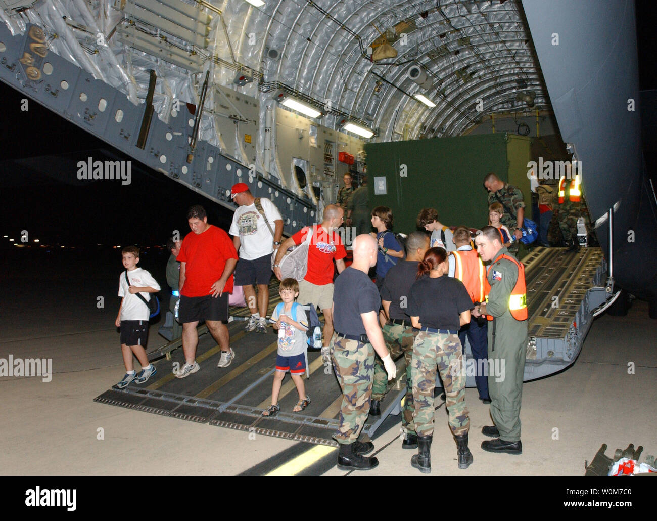 https://c8.alamy.com/comp/W0M7C0/individuals-are-evacuated-from-keesler-air-force-base-mississippi-due-to-flooding-from-hurricane-katrina-on-august-30-2005-they-were-transported-by-the-mississippi-air-national-guard-on-a-c17-to-kelly-city-base-tx-upi-photoheather-norris-W0M7C0.jpg