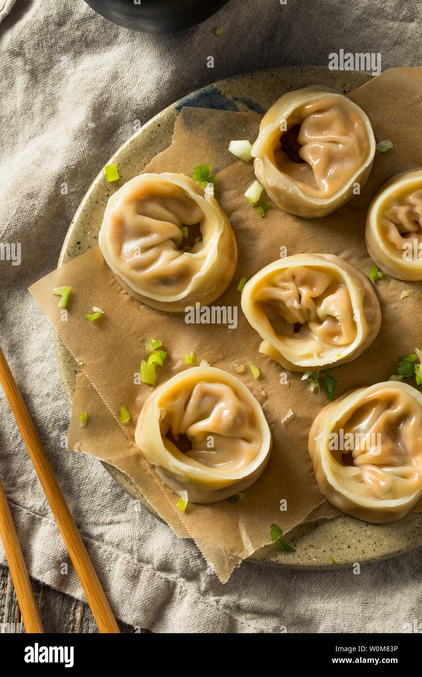 Homemade Korean Kimchi Dumplings with Dipping Sauce Stock Photo Alamy