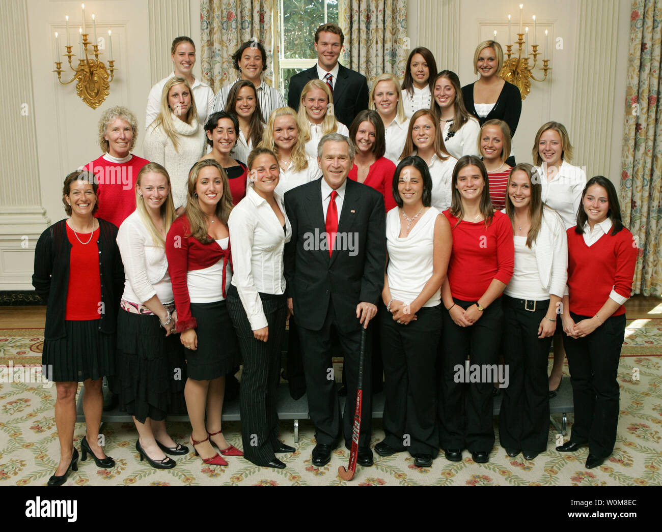 President George W. Bush holds a photo opportunity with the 2005 and 2006 NCAA Champions University of Maryland Women's Field Hockey Team, at the White House in Washington on April 4, 2006. (UPI Photo/Paul Morse/White House) Stock Photo