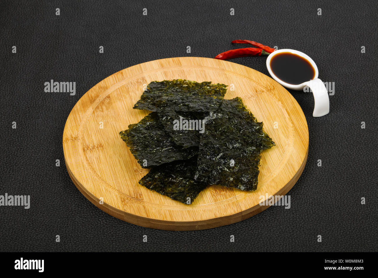 Tasty Nori chips with soya sauce Stock Photo Alamy