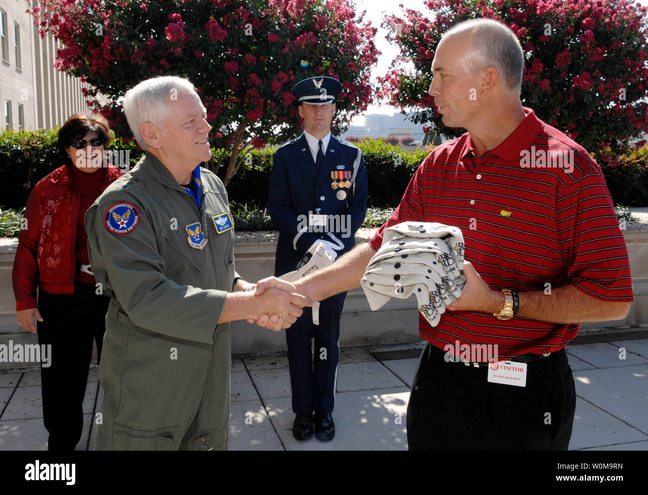 U.S. Ryder Cup team captain Tom Lehman shakes hands with U.S. Air Force Assistant Vice Chief of Staff Lt. Gen. Arthur Lichte after the two exchanged mementos during the Ryder Cup team's visit to the Pentagon on Sept. 17, 2006. The team then went to visit wounded military personnel at Walter Reed Army Medical Center before departing for Ireland to participate in the Professional Golf Association (PGA) Ryder Cup Tournament. (UPI Photo/Cohen A. Young/USAF) Stock Photo
