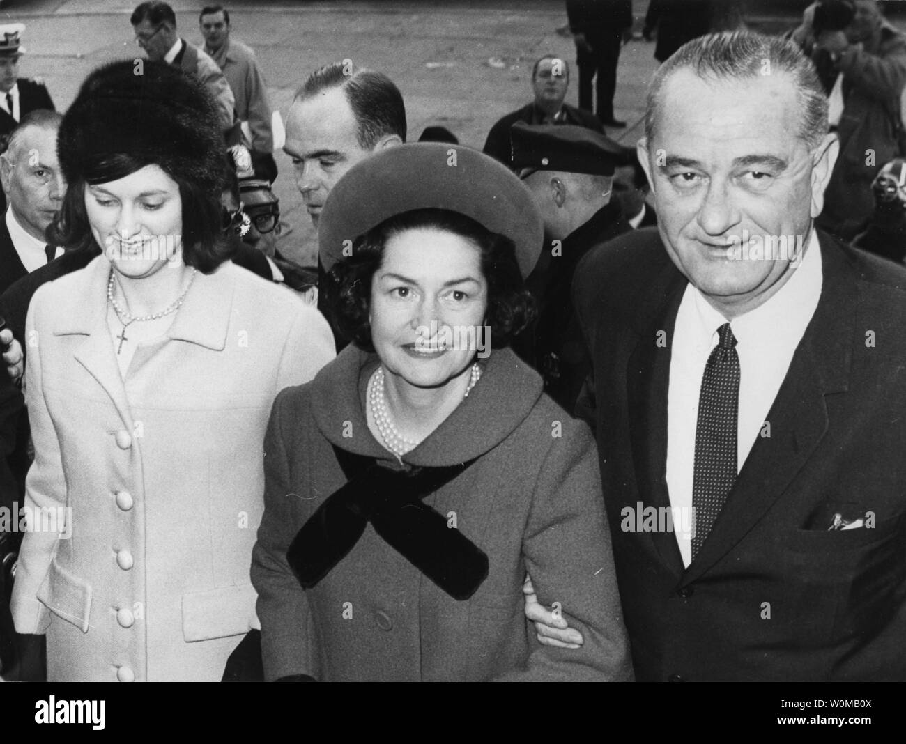 Newly sworn in President Lyndon Baines Johnson and his wife, Lady Bird Johnson (C), and their daughter Lynda Baines, make their first appearance on the steps of National City Christian Church in Washington D.C., where they will attended worship service in this January 20, 1965 file photo. Lady Bird Johnson died July 11, 2007 at her home in Austin, Texas.  (UPI Photo). Stock Photo